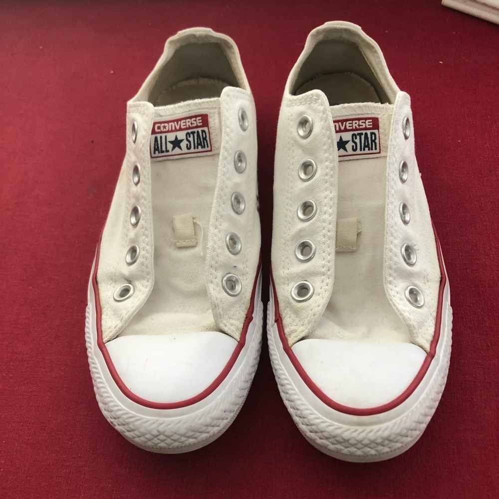 Converse women’s white size 6 sneakers.  Missing laces.
